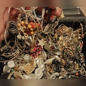 Huge stuffed leather box of random jewelry